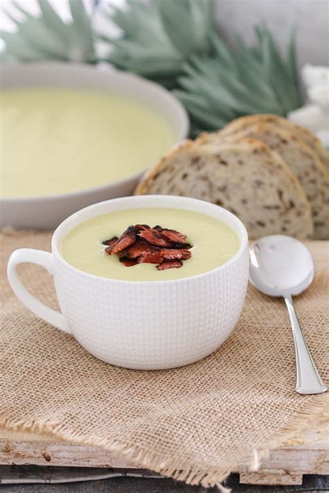A Creamy Potato Leek Soup With Crisy Bacon That Will Be On The Table