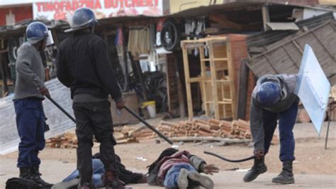 Pics Police Battle Rioters In Harare