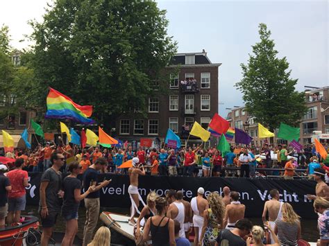 amsterdam gay pride biggest canal parade in europe conscious travel guide