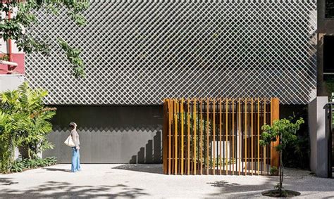 A Beautiful Perforated Facade Filters Natural Light Into