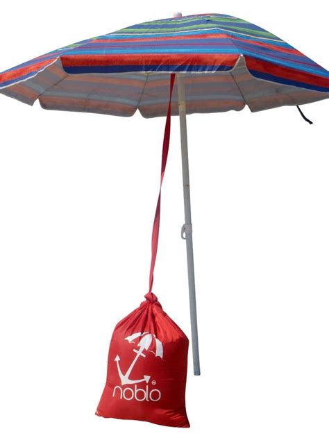 Most beach umbrellas are anchored by placing the support posts in the sand. Noblo Umbrella Buddy--Simple Beach Shade Umbrella Anchor ...