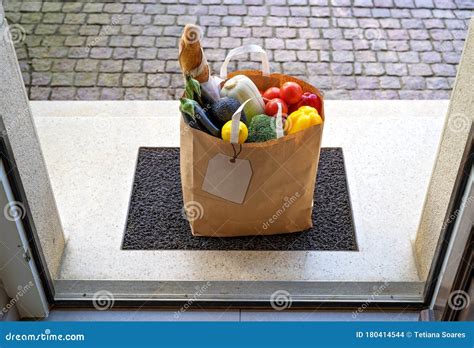 Contactless Food Delivery Service Concept. Paper Bag with Groceries