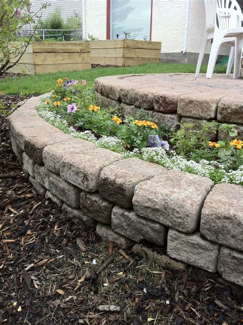 Build A Stacked Stone Flower Bed In A Few Hours Stone Flower Beds