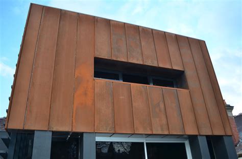 Extruded Windows Clad In Corten Steel Complete Ben Walker Architects Sl