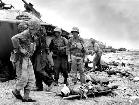 Us Marines Stand Next To The Body Of A Comrade Who Fell In The Early