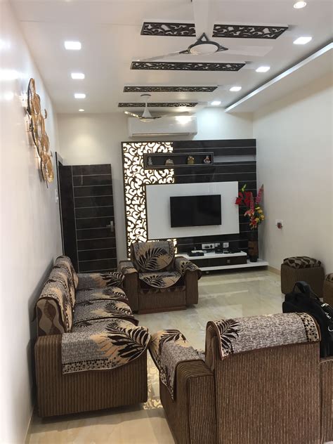 Another urban design for showcasing your items, this design is easy to replicate, if you some basic knowledge of carpentry then you can. living hall sofa | Ceiling design living room, Tv room ...