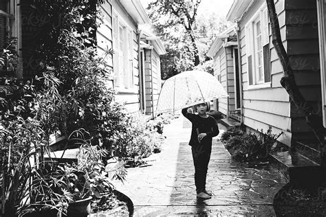 Barefoot In The Rain By Stocksy Contributor Ali Lanenga Stocksy