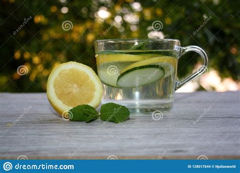 Infused Water With Cucumbers Lemons And Mint Stock Photo Image Of