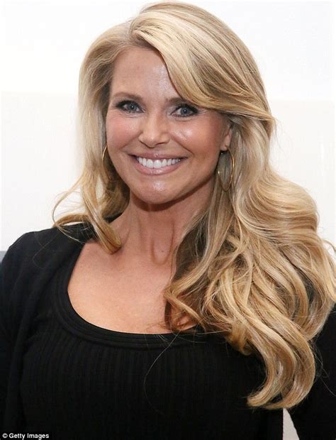 Christie Brinkley 59 Shows Off Her Youthful Side As She Lights Up