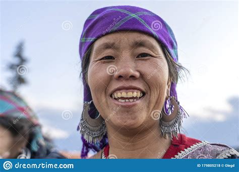 ethnic-hmong-woman-wearing-traditional-attire-and-jewelry-wait-for