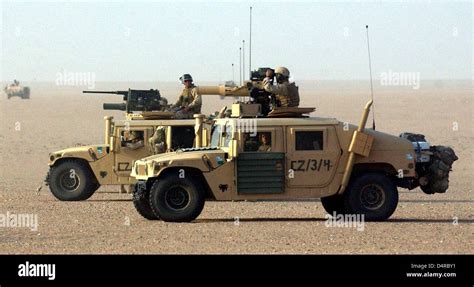 Humvee Military Vehicles Of The Us Marine Armed With Heavy Machine