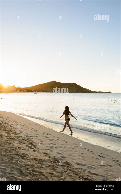 Woman Walking Beach Bikini Stock Photos And Woman Walking Beach Bikini