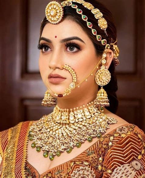 18 Gorgeous Oversized Bridal Nath Designs Idea Bridal Nose Ring In 2021 Bridal Nose Ring