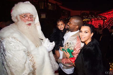 North West Kim Kardashian And Kanye West Pose For Precious Christmas