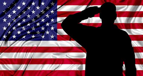 Saluting To Usa Flag Stock Photo - Download Image Now - iStock