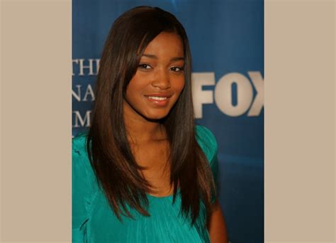 Keke Palmer Wearing Long Straightened Hair In A Natural Style