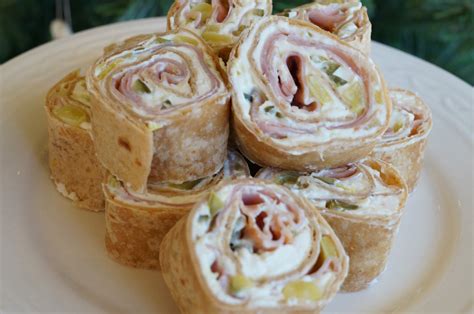 Then top with chicken or ham slice. In the Kitchen with Jenny: Ham and Pickle Roll-Ups