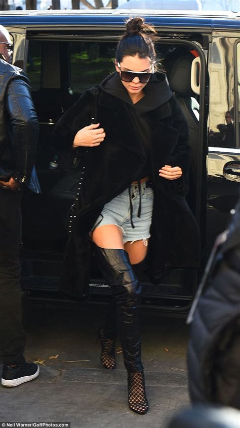 Kendall Jenner Struts Out Of Her Paris Hotel In Racy Thigh High Leather
