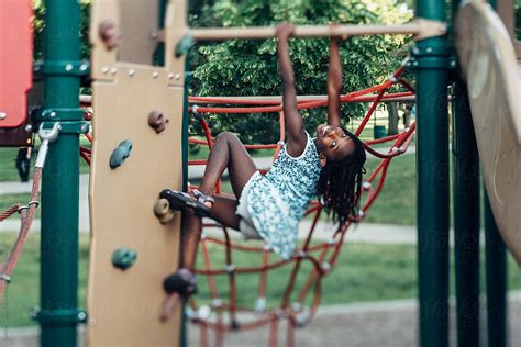 Black Girl Playing On A Playground By Stocksy Contributor Gabriel