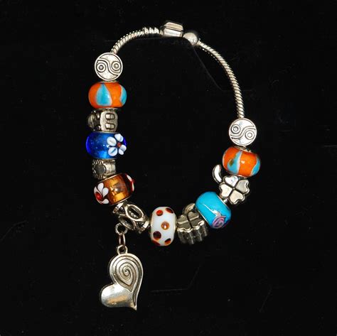 Sterling Silver Charm Bracelet With Multiple 925 Charms Quiet West