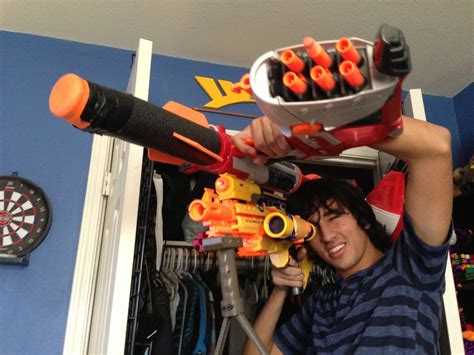 My Friend Wanted To See How Many Nerf Attachments He Could Fit On One
