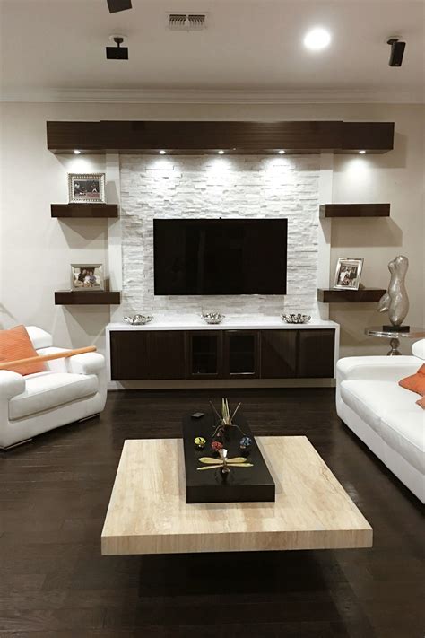 It is used for socializing with guests, watching television or relaxing. 15+ Best Shelves Entertainment Center Design You Have To ...