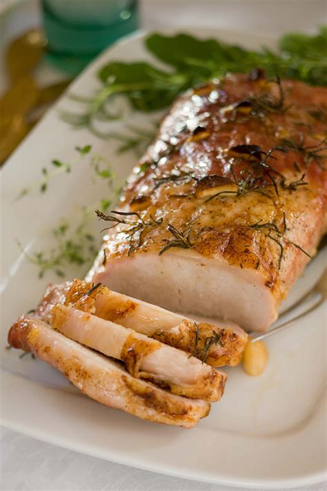 Long strips of seasoned boneless pork are skewered with long forks and placed in a covered oven or over a fire. Roast Pork Loin Recipe - Relish