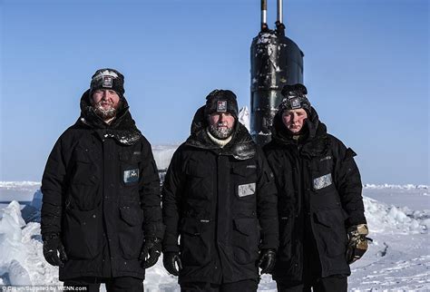 Royal Navy Submarine Crew Enjoy A Game Of Cricket At The North Pole