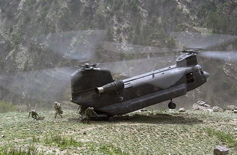 A Us Army Usa Ch 47 Chinook Helicopter Offloads Coalition Forces