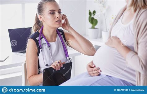 Gynecology Consultation Pregnant Woman With Her Doctor In Clinic Stock Image Image Of Health