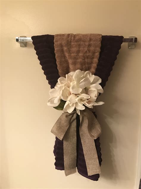 In the guest bathroom, i like to keep at minimum a toilet freshener and some scented beads in the bathroom. Bathroom towel decor | Bathroom towel decor, Decorative ...