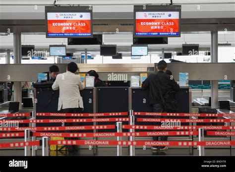 Passengers Checking In At Chek Lap Kok International Airport Hong Kong