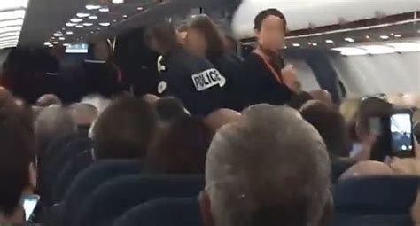 Moment Police Escorting Disruptive Easyjet Passenger Off Flight Forced To Make Emergency