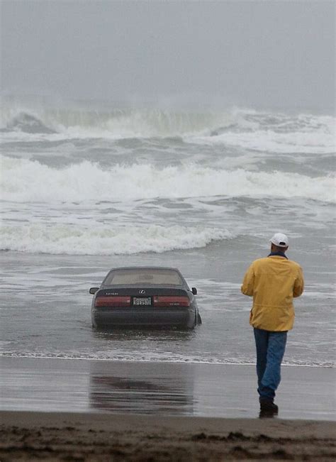 Woman Drives Car Into Water At Ocean Beach