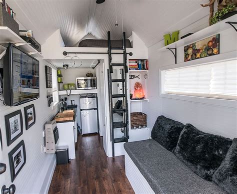 I'm an interior designer in stockton, ca, who helps overwhelmed homeowners find their style, and all the houzz and this is the hatteras tiny house on wheels by modern tiny living. Tiny House Living for Big Rewards