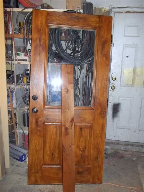 Once the door is completely dry, look at it sideways to see if you missed anything and touch up as needed. Fiberglass door painted to look like wood. | Painted doors ...