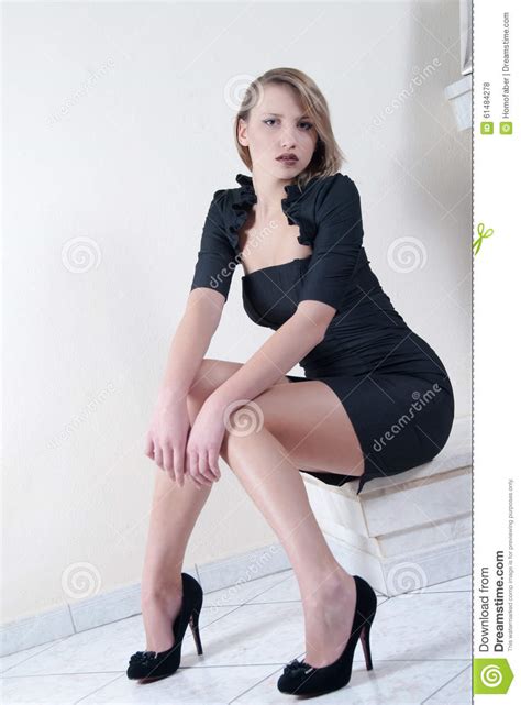 Lady long legs webtoon is about comedy, drama, harem story. Indoor Shoot Of A Model In A Black Dress Stock Photo ...