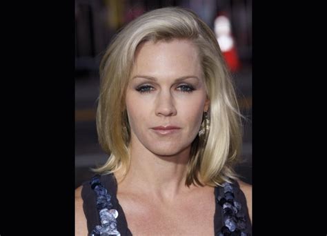 Jennie Garth Wearing Her Hair With The Top Styled Over To One Side