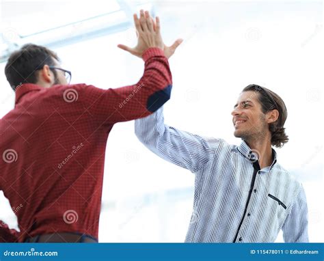 Two Business Men Giving Each Other A High Five Stock Image Image Of