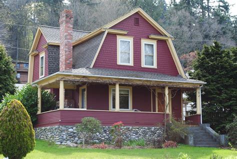 A single accent color on the door and shutters emphasizes the symmetrical facade, a hallmark of the colonial. Dutch Colonial Revival in Red | Bellingham - Forest St ...