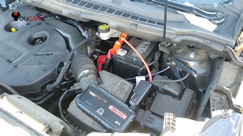 Remove the black negative clamp from the assisting vehicle. How to jump start Ford Edge dead battery