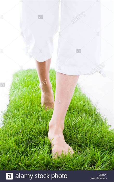 Bare Feet Walking On Grass Stock Photo Alamy