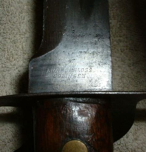 I would call it lightly used and badly stained. Dutch Klewang Marechausse or Netherlands Klewang M1898 ...
