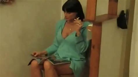 Cigarette Smoking Milf Gets Horny While Sitting On The Toilet Porn Videos