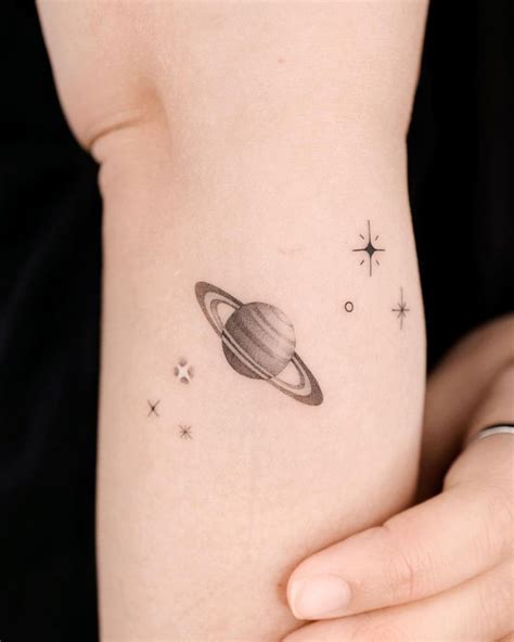 48 Saturn Tattoos And Saturn Tattoo Meanings Inked And Faded Saturn