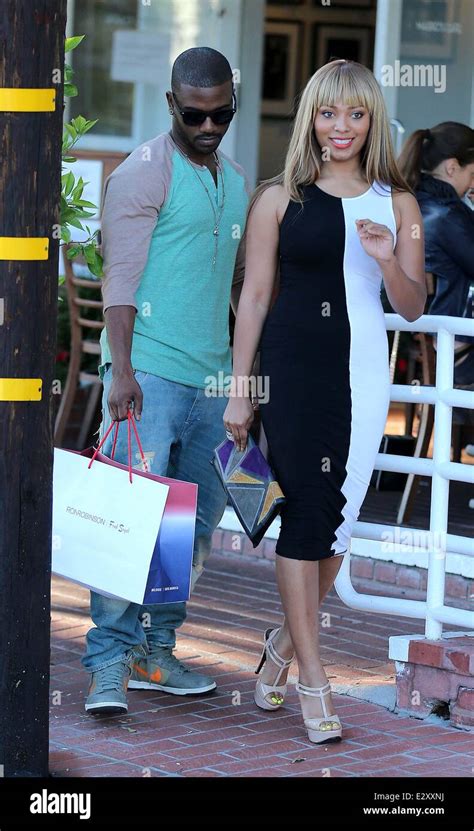 Ray J Leaving Fred Segal In West Hollywood With Singer Teairra Mari After Shopping Featuring