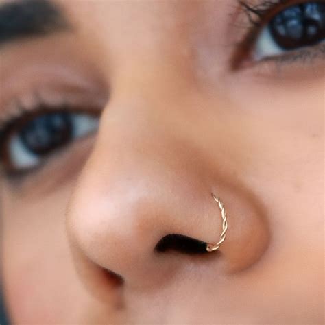 Hoops Are A Favorite Type Of Jewelry For Nose Piercings And A Staple Piece In Everyones Nose