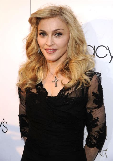 madonna exposes 17 year old s breast during australian concert