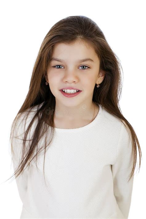 Portrait Of A Charming Little Girl Smiling At Camera Stock Image