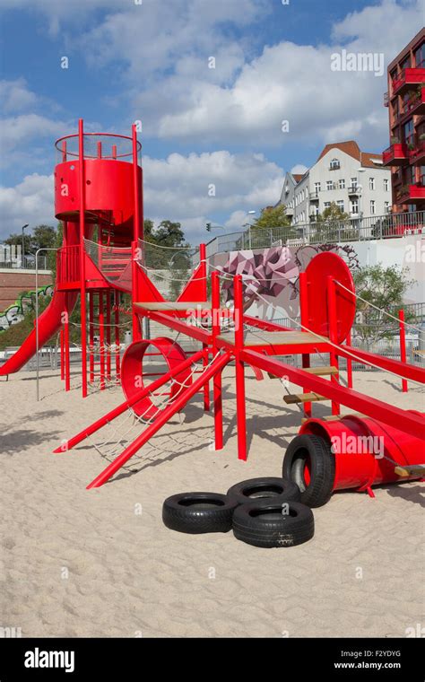 Kids Playground With Red Slide Climber And Sandpit Stock Photo Alamy